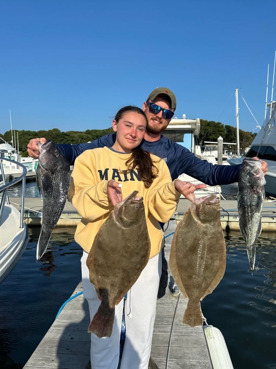 Fluke on the dock at the end of a trip